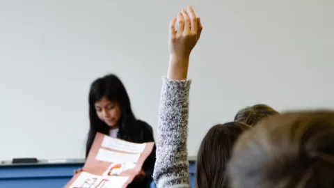 Classroom student raising hand