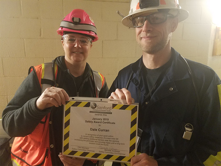 Michelle Andresen presents Dale Curran with the Safety Recognition award. Photo by John Scheetz