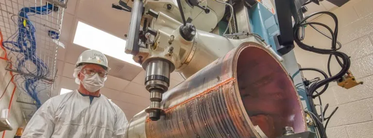 Machinist works on copper