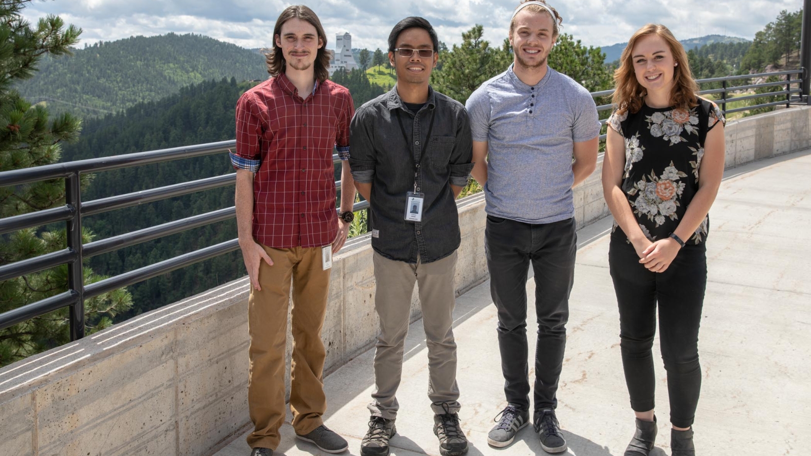 2018 Sanford Lab summer interns stand in front of Grizzly Gulch after their presentations. 