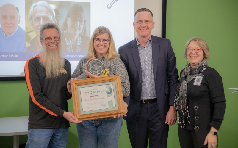 The first CORES award presented to Crow Peak Brewing Co. Pictured left to right are Crow Peak Brewing Co. owners Jeff Drumm and Carolyn Ferrel, SURF Executive Director Mike Headley and Communication Director Constance Walter.