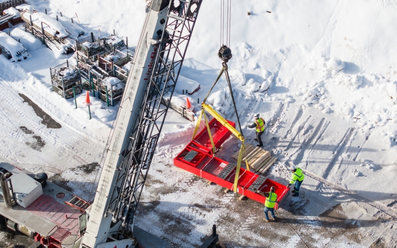 This image shows D&W Crane and Rigging in Rapid City, unloading a large piece of steel that will be used for DUNE at SURF. The lifting slings being used here were sourced through Dakota Riggers & Tool Supply in Sioux Falls. 