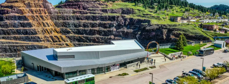 The sanford lab homestake visitor center as seen from the air.