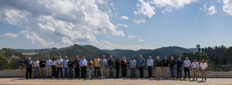 A group photo outside at SURF of those gathered for the workshop