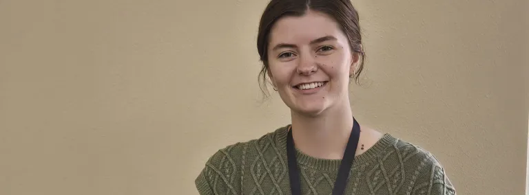Emily Siemonsma in a classroom with scientific equipment 