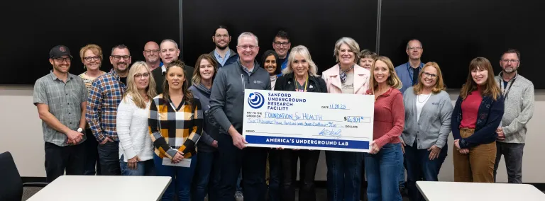 Group photo during the 2025 Breast Cancer Awareness Fundraiser Check presentation 