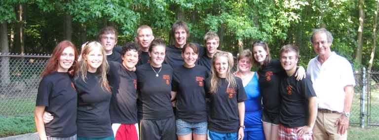 A group photo of the 2010 Davis-Bahcall cohort at a swimming pool. 