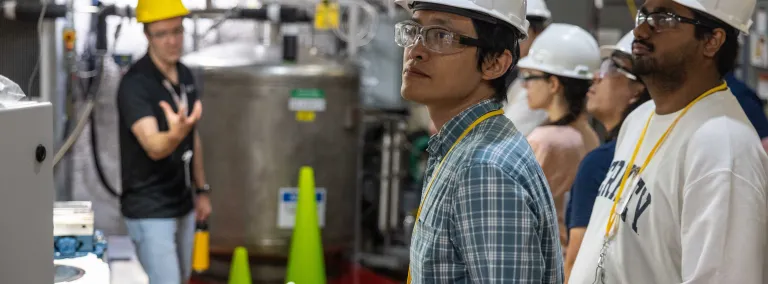 Attendees tour the LUX-ZEPLIN experiment on the 4850 Level of SURF during the CETUP* summer workshop.  