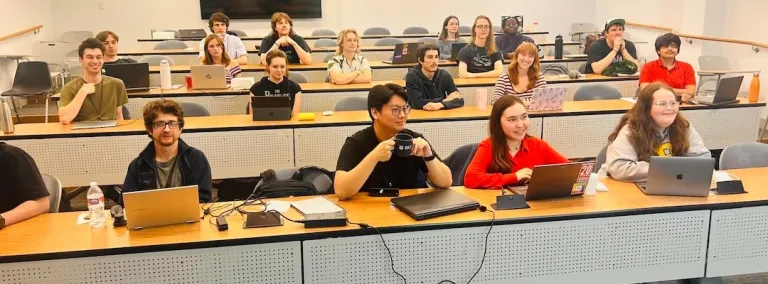 Students at DUNE-TECH attend a lecture at Rice University. 
