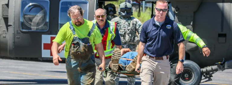 A Black Hawk helicopter landing at Sanford Underground Research Facility was part of a two-day emergency response training at Sanford Lab, in partnership with the National Guard. 