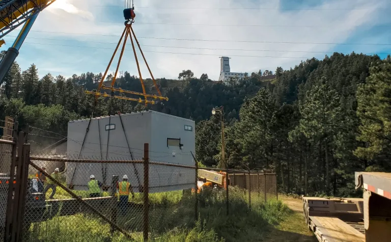 crane lowers component of ventilation system in kirk canyon