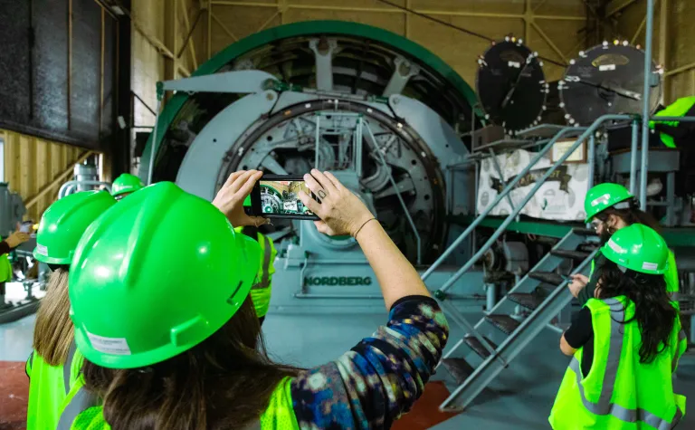 A tourist takes a photo of the Yates Hoist.