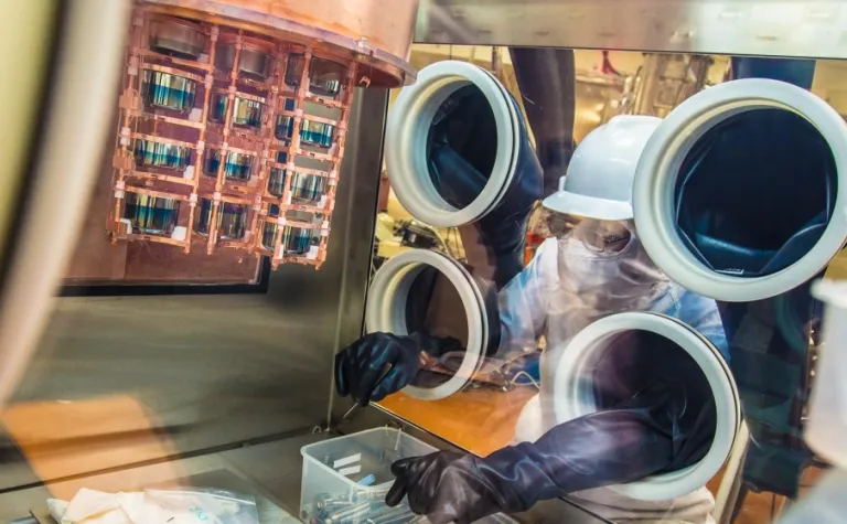 Researcher working in glove box