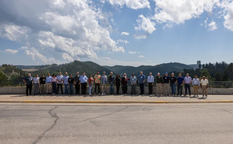 A group photo outside at SURF of those gathered for the workshop