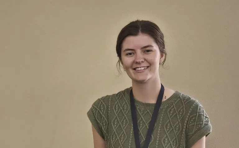 Emily Siemonsma in a classroom with scientific equipment