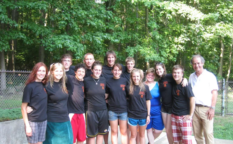 A group photo of the 2010 Davis-Bahcall cohort at a swimming pool. 