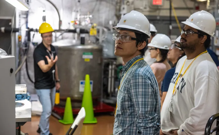 Attendees tour the LUX-ZEPLIN experiment on the 4850 Level of SURF during the CETUP* summer workshop.  