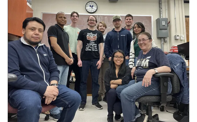 David Martinez Caicedo, left, with his team at South Dakota School of Mines & Technology. 