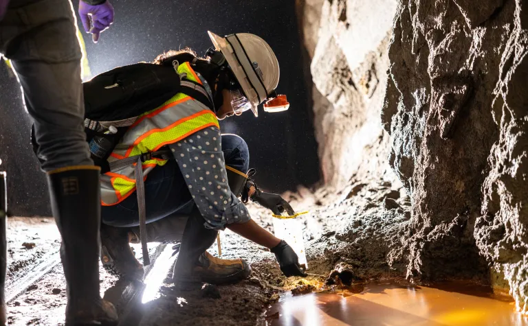 Dr. Tanvi Govil, sampling for microbes on the 1700 Level of the ground at the Sanford Underground Research Facility.