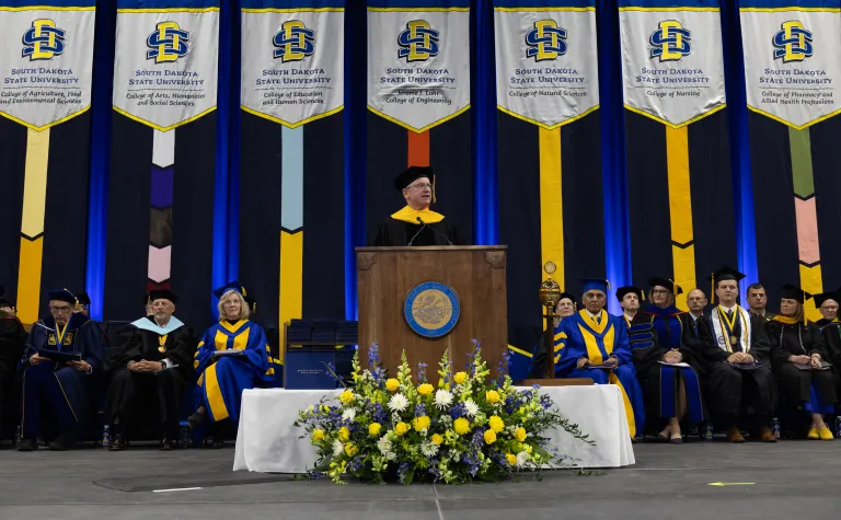 MIke Headley speaking at SDSU 2026 Commencement 
