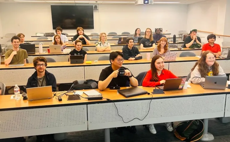 Students at DUNE-TECH attend a lecture at Rice University. 