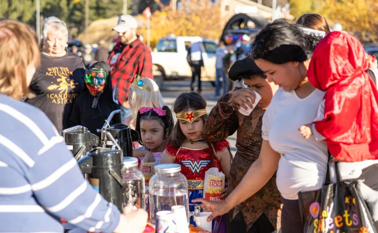 Dark Matter Day / Halloween Trunk or treat at SURF with children and families trick-ro-treating in costume 