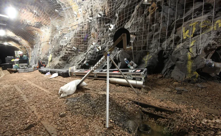 kISMET lowered monitoring equipment into a borehole underground. 