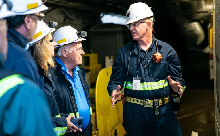 Mike Headley, right, leads a tour of SURF with T. Denny Sanford, left, whose generous donations helped to make the facility a reality in 2008. 