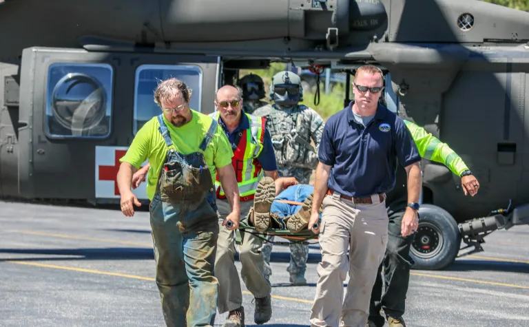A Black Hawk helicopter landing at Sanford Underground Research Facility was part of a two-day emergency response training at Sanford Lab, in partnership with the National Guard. 