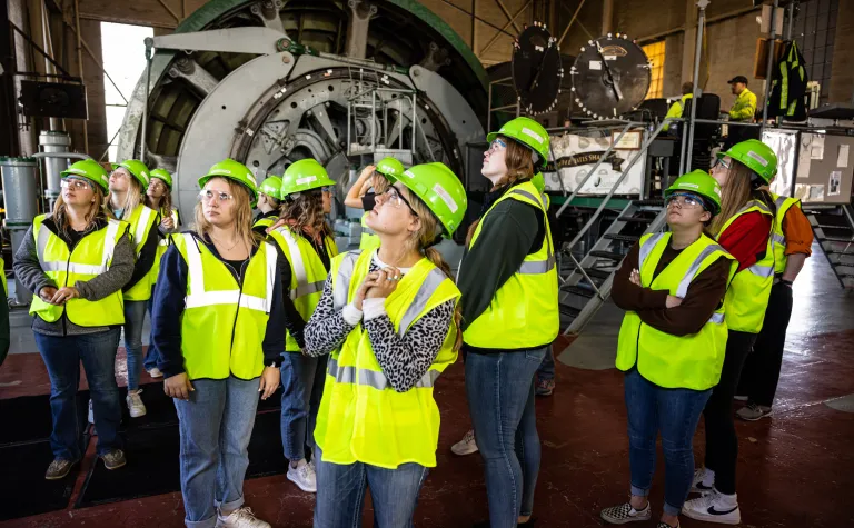 Black Hills State University education majors view the Yates Hoistroom at the Sanford Underground Research Facility during a education training session. Photo by Stephen Kenny 