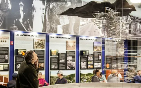 Person studying the underground scaled model in the Sanford Underground Research Facility