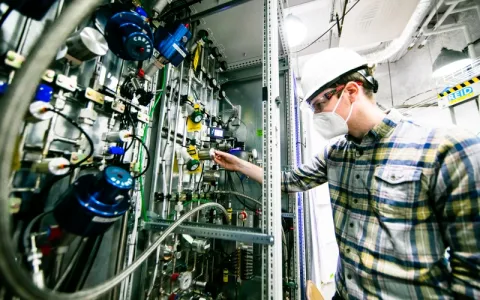 scientist works with the xenon system