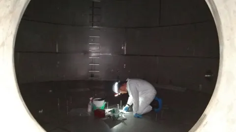 a researcher working on the floor