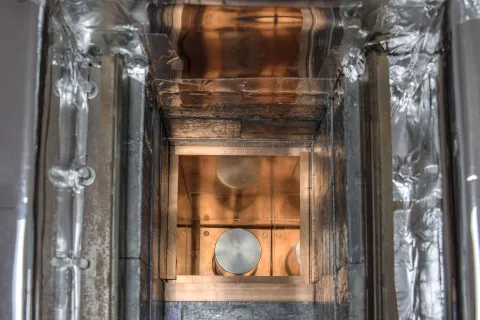 The inside of a copper lined box that is part of a low background counter. 