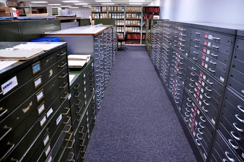 Decades of letters and telegrams, together with black-and-white photographs, full-color flyers and handwritten engineering notes were compiled and stowed in an archive room in the headquarters of Nordberg Manufacturers in downtown Milwaukee- this is a room full of filing cabnets. Courtesy Siemag Tecberg, Inc.