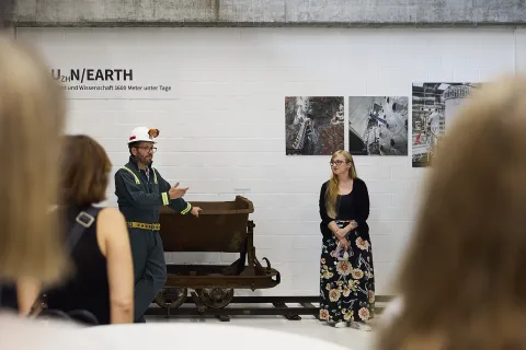 UZH physics professor Björn Penning (left) speaks during an opening program for the exhibit. He is joined by exhibit curator Melanie Widmer at the UZH Science Pavilion.
