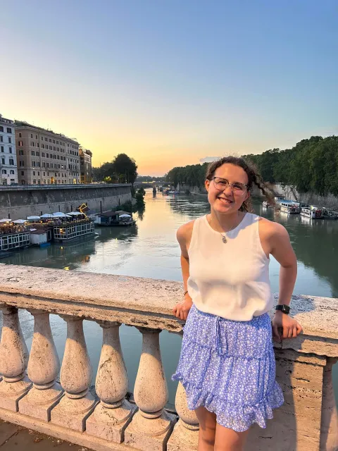 Grace Davis poses in Rome in 2023 during her travels with the Davis-Bahcall Scholar Program. 