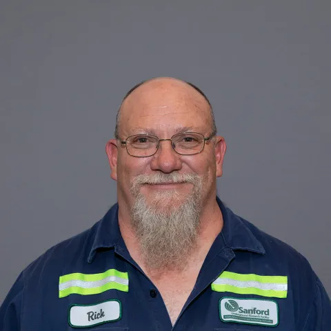 Rich Ellison headshot in a SURF uniform. 