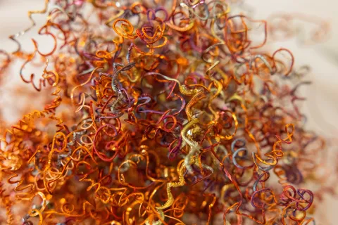 Ribbons of ultrapure copper left over after machining.