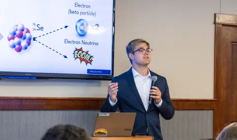 Connor Matthies 2023 Davis-Bahcall Scholar giving a presentation at Black Hills State University 