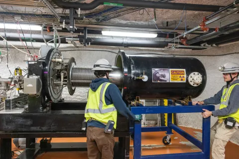Removing a shell that covers the Van de Graaff generator and components for the CASPAR experiment 