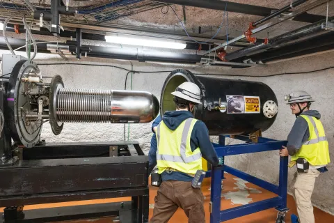 Removing a shell that covers the Van de Graaff generator and components for the CASPAR experiment 