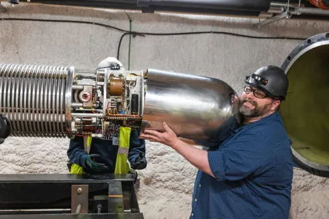 Removing a shell that covers the Van de Graaff generator and components for the CASPAR experiment 