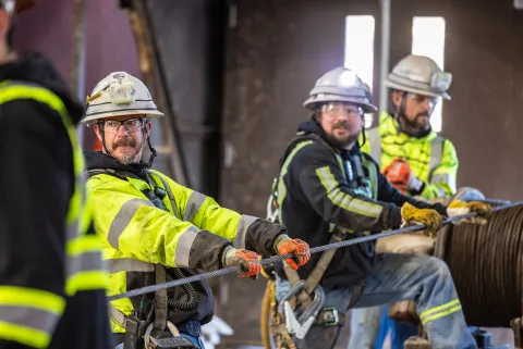 Ross Shaft Crews work alongside technicians at Fortis Mining Engineering & Manufacturing Company on the rope change. 