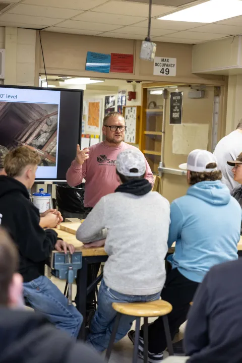 Chad Ronish teaching a highschool class 