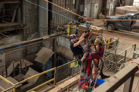 William Buckman from NIM Medical completing a mock rope rescue at SURF.