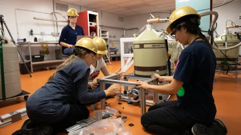 Students working on a detector