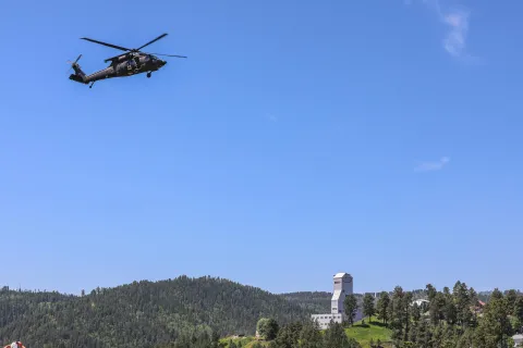 Helicoper landing the Sanford Lab parking.