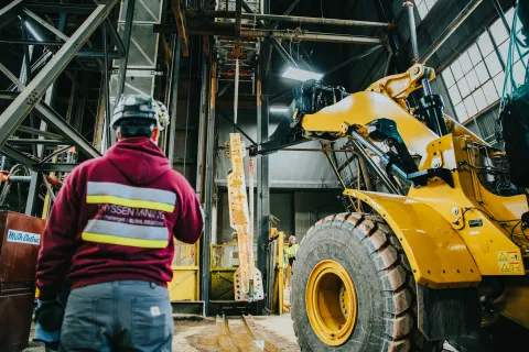 a large piece of metal is slung under the cage in the Ross Shaft