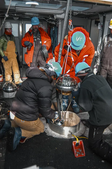 crew drills a hole 
